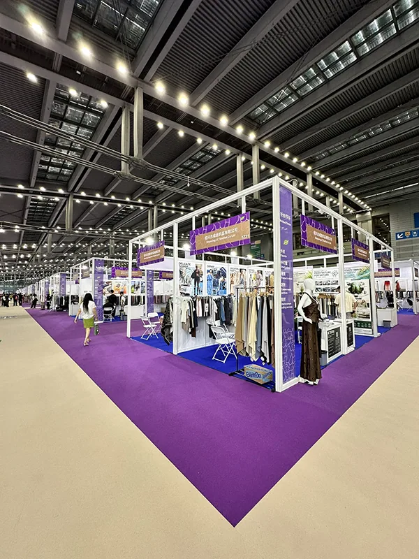 Supplier booth presenting sustainable apparel fabrics in Shenzhen